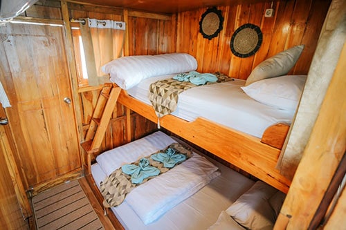 Cabin with bunk beds on Phinisi boat